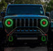 Front end of a Jeep with ColorSHIFT Oculus Headlights installed, and green halo rings.
