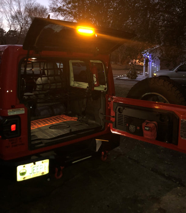 Red jeep with amber LED cargo light