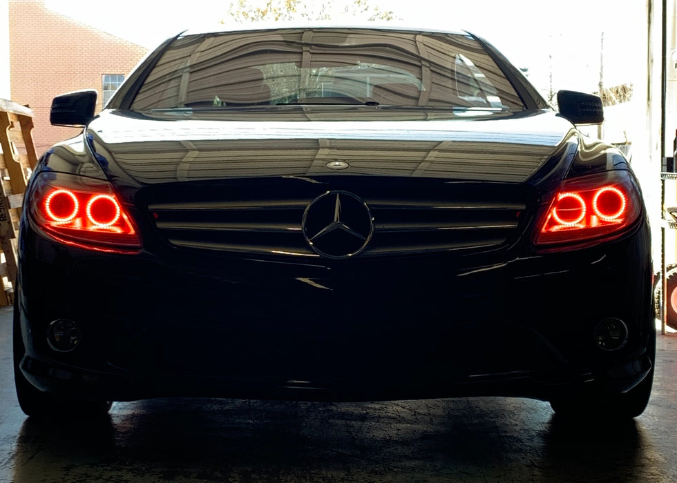 Front end of a Mercedes Benz CL 550 with red LED headlight halo rings.
