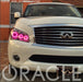 Front end of an Infiniti QX56 with pink LED headlight halo rings installed.