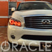 Front end of an Infiniti QX56 with red LED headlight halo rings installed.
