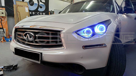Front end of an Infiniti QX70 with blue LED headlight halo rings installed.