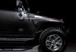 Side view of a Jeep Wrangler JK equipped with the Sidetrack™ LED Fender Lighting System.