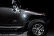 Side view of a Jeep Wrangler JK equipped with Sidetrack™ LED Fender Lighting System, with white LEDs.