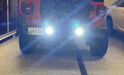 Close-up on the bumper of a Jeep Wrangler JL with Rear Bumper LED Reverse Lights installed, and turned on.