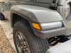 Close-up of "Smoked Lens" LED Front Sidemarkers installed on a Jeep.