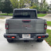 Rear view of a grey Jeep Gladiator with Flush Mount LED Tail Lights installed.