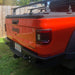 Rear end of a red Jeep Gladiator with Flush Mount Tail Lights installed.