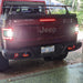 Rear end of a Jeep Gladiator JT with Flush Mount LED Tail Lights installed and reverse lights on.