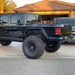 Side view of a black Jeep Gladiator JT with Flush Mount LED Tail Lights installed.