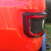 Close-up of a Flush Mount LED Tail Light installed on a red Jeep Gladiator.