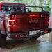 Rear view of a Jeep Gladiator JT with Flush Mount LED Tail Lights installed and brake lights on.