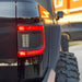 Close-up of a Flush Mount LED Tail Light installed on a Jeep Gladiator JT with running lights on.