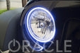 Close-up of white LED halo ring installed on a Jeep.