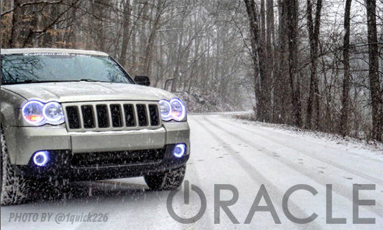 Jeep Grand Cherokee with white LED headlight and fog light halos installed.