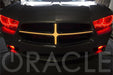 Front end of a Dodge Charger with amber LED Illuminated Grill Crosshairs installed.