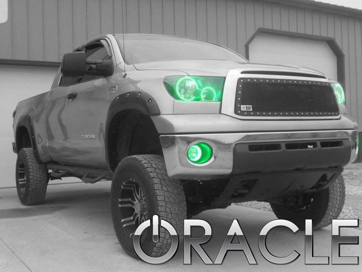 Three quarters view of Toyota Tundra with green LED headlight halo rings.