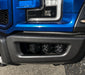Close-up of Black Series - 7D 3" 20W LED Square Spot/Flood Lights installed in the fog light housings of a Ford Raptor.