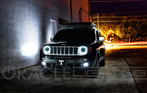 Three quarters view of a Jeep Renegade with white LED headlight halo rings installed.