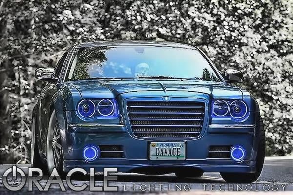Front end of a Chrysler 300C with blue LED headlight and fog light halo rings.