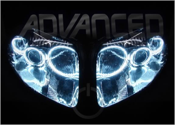 Toyota Supra headlights with white LED halo rings.
