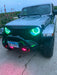 Front end of a Jeep with ColorSHIFT Oculus Headlights installed.