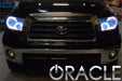Front end of a Toyota Tundra with white LED headlight halo rings.