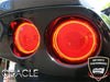 Close-up of C6 Corvette tail lights with halos glowing