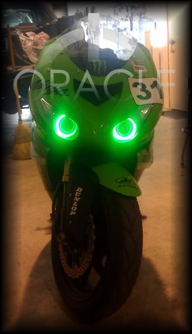 Kawasaki ZX10R with green LED headlight halo rings installed.