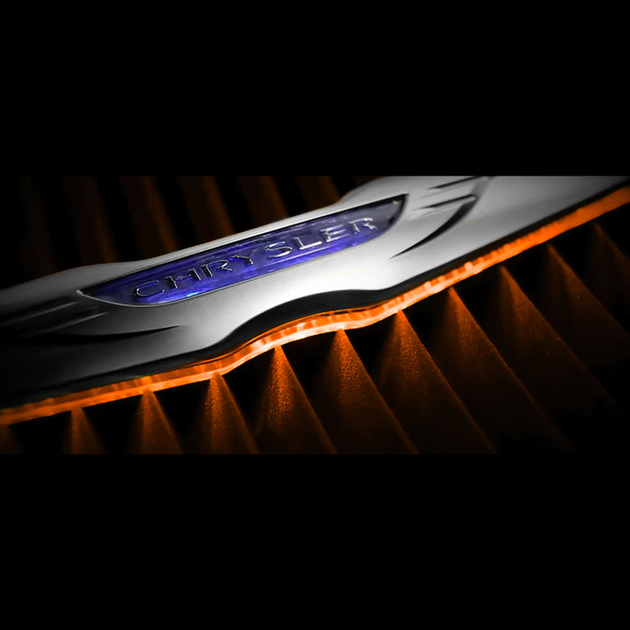 Close-up of Gen II Chrysler Illuminated LED Rear Wing Emblem with amber LEDs.