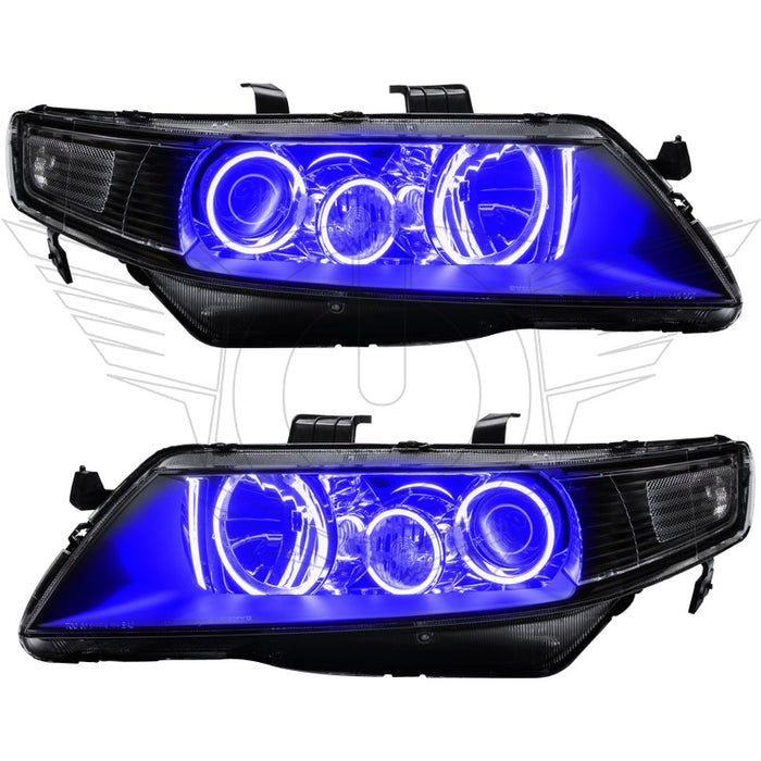 Acura TSX headlights with blue LED halo rings.