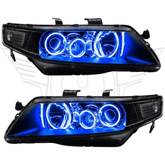 Acura TSX headlights with blue LED halo rings.