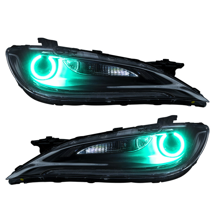 Chrysler 200 headlights with cyan LED halo rings.