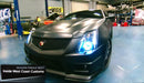Front view of a Cadillac CTS-V Coupe with white LED headlight halo rings.