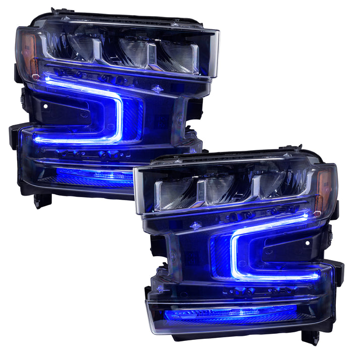 Chevrolet Silverado 1500 headlights with blue DRLs.