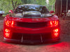 Front end of a Chevrolet Camaro with red LED headlight and fog light halo rings installed.
