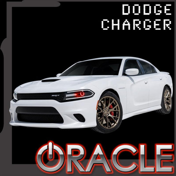 White dodge challenger with red projectors and ORACLE Lighting logo