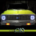 Front end of a Chevrolet C10 Truck with white LED headlight halo rings installed.
