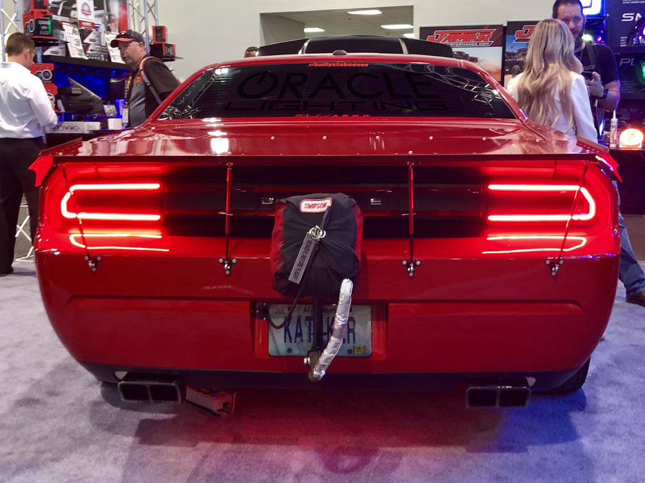 Rear end of a Dodge Challenger with Afterburner LED Tail Light Kit installed.