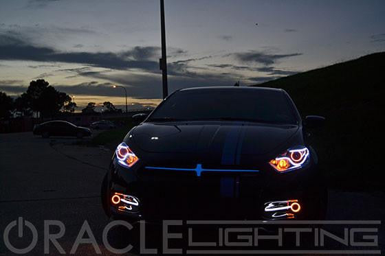 Dodge dart at night with LED headlights and grill crosshair