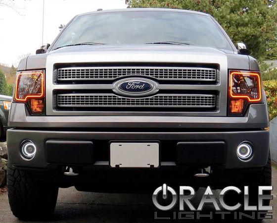 Front end of a Ford F-150 with amber LED headlight halo rings.