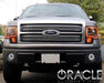 Front end of a Ford F-150 with amber LED headlight halo rings.