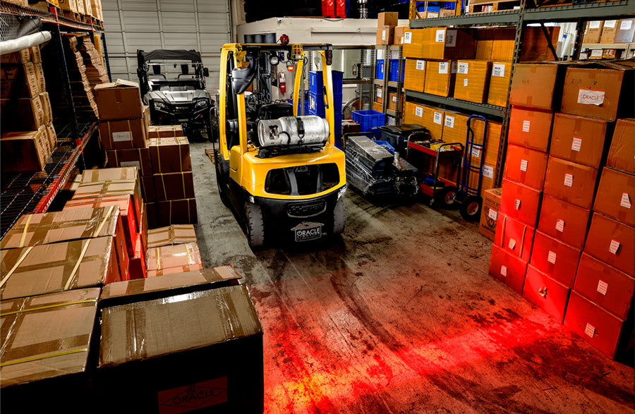 Forklift equipped with LED Safety Red-Line Pedestrian Awareness Light