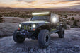 Three quarters view of a Jeep Wrangler JK with LED Off-Road Side Mirrors installed.