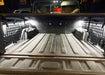 Truck bed with Truck Bed LED Cargo Light 60” Pair w/ Switch installed.