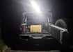 Rear view of a Jeep Wrangler with Cargo LED Light Module installed and turned on.
