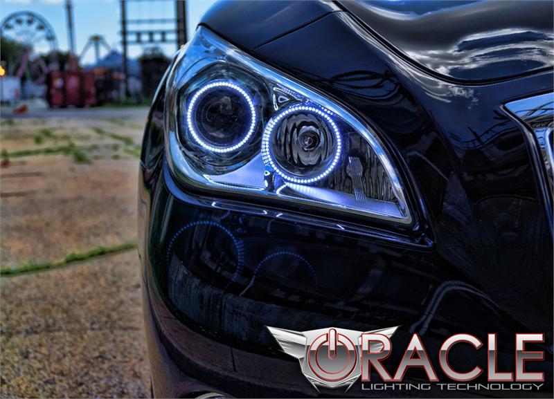 Close-up of white LED headlight halo rings installed on an Infiniti M37.