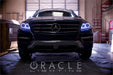 Front end of a Mercedes-Benz ML Class with white LED headlight halo rings installed.