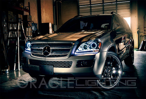Three quarters view of Mercedes-Benz GL 450 with white LED headlight halos installed.