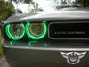Close-up on challenger headlights with green halos
